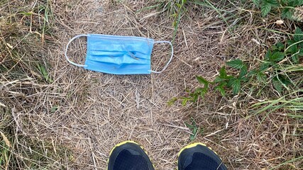 feet in the grass face masks pollution ecology issues 