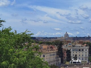Fototapeta na wymiar Panorama of Rome with a view of the dome of St. Peter's in the Vatican.