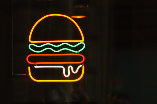 neon sign burger showcase restaurant marketing billboard