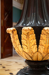 gold leaf design on vase