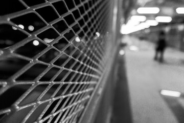 Selective closeup of a chrome steel grating in a station