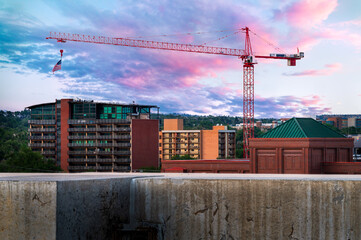 Construction crane with a beautiful sunrise sky