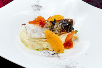 baked white fish on mashed potatoes