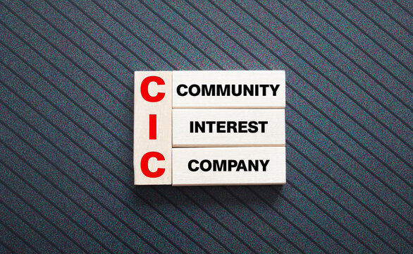 text Community Interest Company - CIC on wooden block
