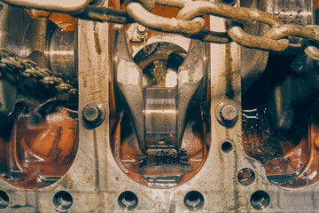 Bottom of Crankshaft and Cylinder Block and Bolt of Car Engine and Chain in Vintage Tone