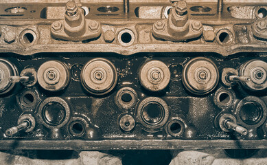 Obraz na płótnie Canvas Top View Black and White Intake Valve and Exhaust Valve and Fuel Injector on Cylinder Head of Truck Engine