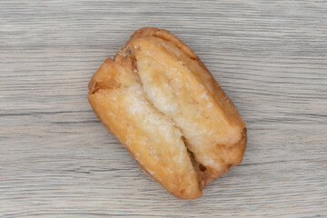 Overhead view of old fashioned buttermilk bar is textured with glazed coating for a sweet treat delight