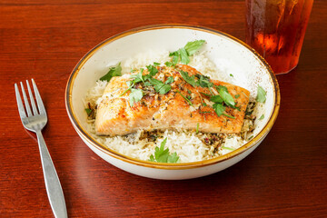 Broiled salmon over rice