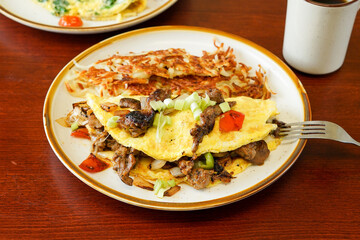 Omelette with hashed brown potatoes