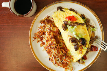 Omelette with hashed brown potatoes