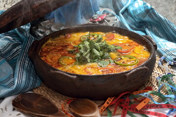 Fish moqueca, a classic dish of Bahian cuisine, served in a clay pot