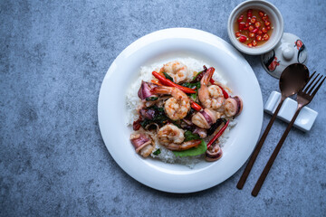 Basil fried rice  shrimp squid, Thai food rice stir-fried seafood with chili and basil leaves