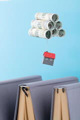 The little house that was carried by banknotes on the book
