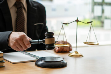Judge gavel with Justice lawyers, Businessman in suit or lawyer working on a documents. Legal law,...