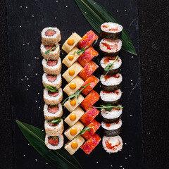 tasty sushi on the black background