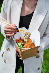 Asian people preparing fast food for lunch