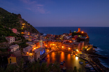 Fototapeta na wymiar Vernazza at twilight or sunset travel and tourism- Cinque Terre, Italy