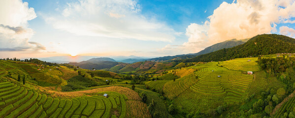 Panorama Aerial View sunlight at twilight of Pa Bong Piang terraced rice fields, Mae Chaem, Chiang Mai Thailand	