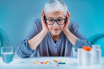 Senior patient failing to follow medical advice, demonstrating prescribed medicine non-adherence behavior.