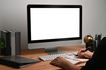 Cropped shot creative man working with computer in home office.