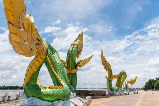 Close-up Low angle of Twin Green Naga statue at the mekong river, Wat Lamduan temple, Nong Khai province Thailand. Most famous landmark.