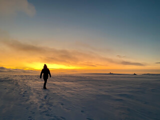 Nordkapp, Norway in January: person in the midnight sun in the most north point of Europe