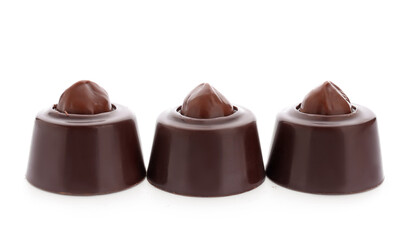 Sweet chocolate candies on white background