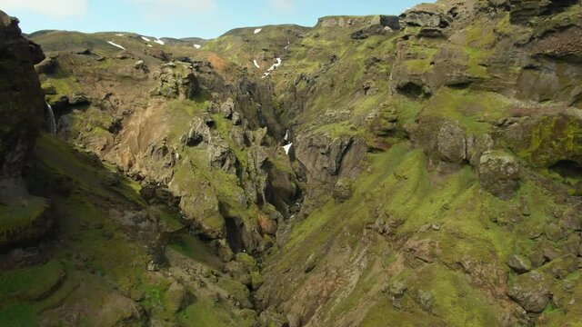 Drone dolly-in shot of Thakgil Iceland Valley