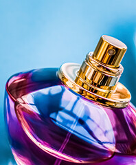Perfume bottle on glossy background, sweet floral scent, glamour fragrance and eau de parfum as...