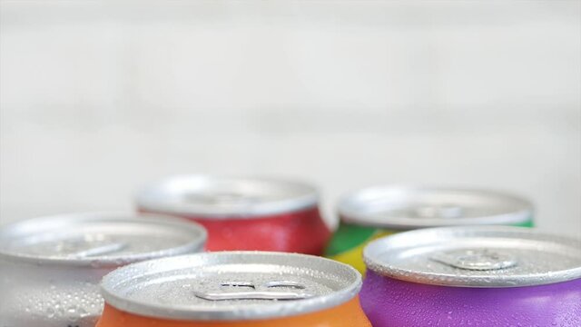 Shooting with Refreshing Pop Can Drinks. Various Cold, Sweet, and Carbonated Refreshing Drinks. 
