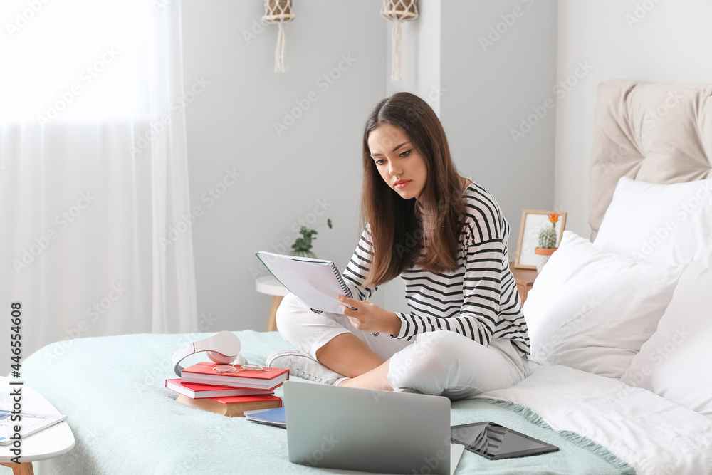 Sticker female student preparing for exam at home