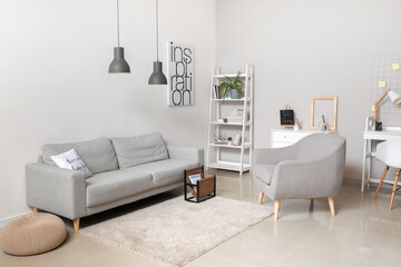 Interior of modern room with cozy sofa