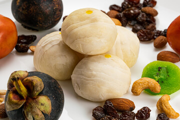 High angle view of chinese pastry or moon cake filled with sweet mung bean paste and salted egg yolk.