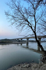 after sunset twilight over the river with a bridge