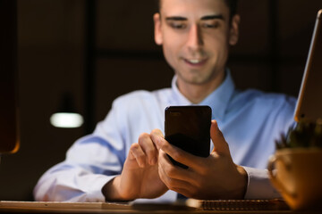 Businessman working in office late at night
