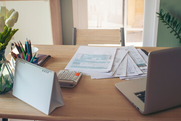 Individual Income Tax Return Form, laptop, and calculator For who have income According to United...