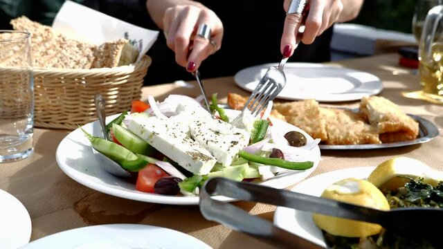 Greek salad and saganaki in Taverna