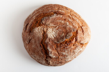 Fresh crusty handcraft bread on white background.