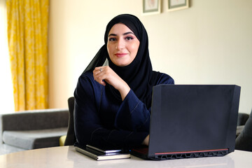 Arab Emirati Algerian business woman. Authentic Arabic lady not Indian wearing Abaya Hijab ideal...