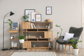 Interior of stylish living room with pictures