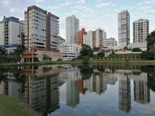 buildings and reflections in the river
