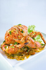 wok stir fried big meat crab seafood with chilli sauce, golden salted egg yolk asian halal menu