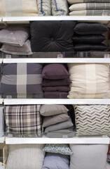 Fototapeta na wymiar Cool gray scale cushions and bed wear on shelves