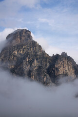 Fototapeta na wymiar dramatic sky on mountain peaks of italian alps