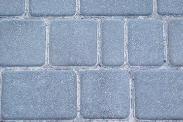 Old natural stone wall on background. Brick wall with ancient masonry. Full frame of rich and varied texture close up.