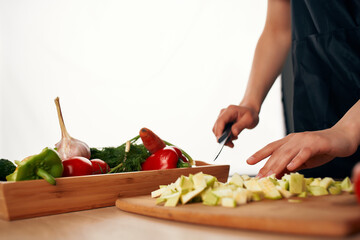 cutting vegetables on a cutting board kitchen close-up fresh