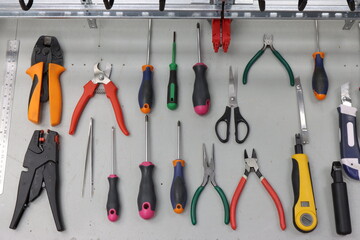 Tools for installation and repair of an electric panel.