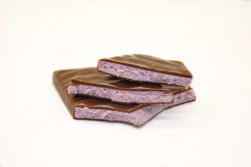 pieces of chocolate with filling on white