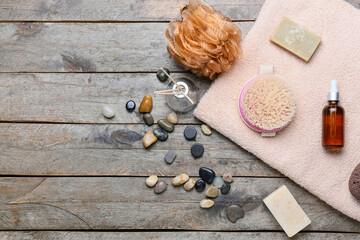 Composition with massage brush on wooden background