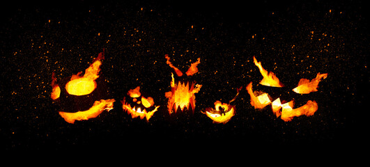 Burning pumpkins on black background. Jack-o-lanterns decoration. Halloween concept.